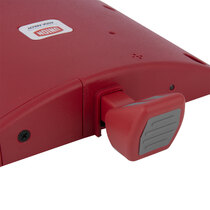 Easy to use foot pedal for retaining fire doors